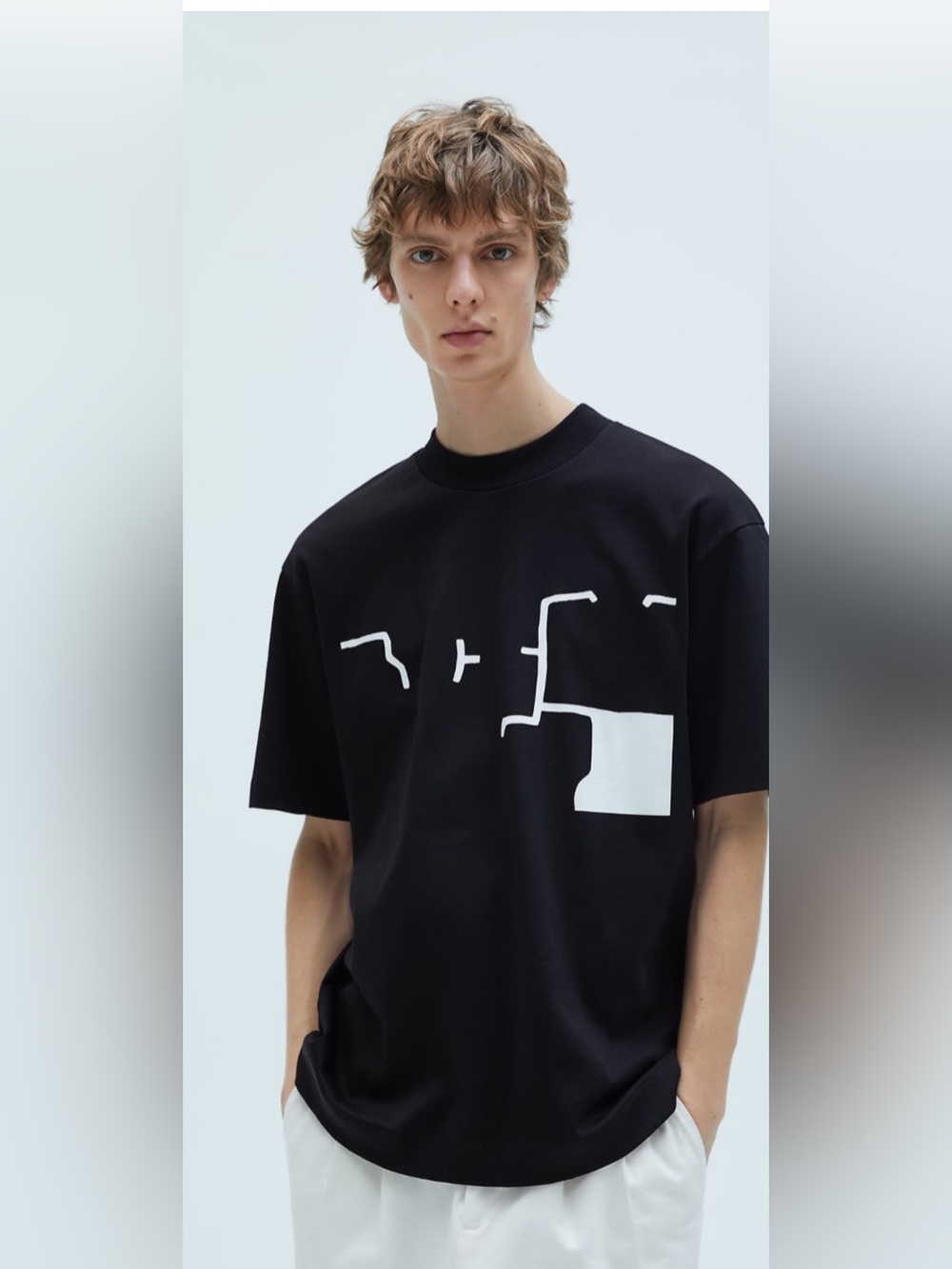 Zara Black Tee with White Abstract Design